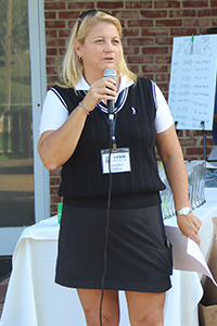 VIMS Associate Director of Advancement Jennifer Dillon addresses Mermaid Cup attendees during awards presentation.