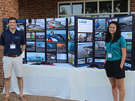 VIMS graduate students Willy Goldsmith (L) and Gail Schweiterman (R) answered questions from Mermaid Cup attendees about their research activities.