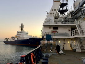 The R/V {em}Revelle{/em} (L) and the R/V {em}Sally Ride{/em} will leave Seattle for a 6-week expedition in the northeast Pacific, where a multidisciplinary team of scientists will study the life and death cycles of plankton for the benefit of future ocean satellite missions. © N. Nelson/UC Santa Barbara