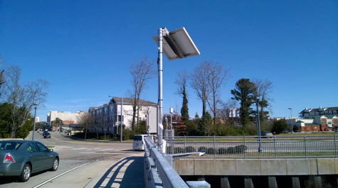 A StormSense water-level sensor atop a bridge near Pinewood Road in a low-lying area of Virginia Beach.  © D. Loftis/VIMS.