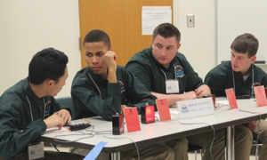 Members of Team B from Bishop Sullivan Catholic High School in Virginia Beach discuss a bonus follow-up question. © C. Katella/VIMS.