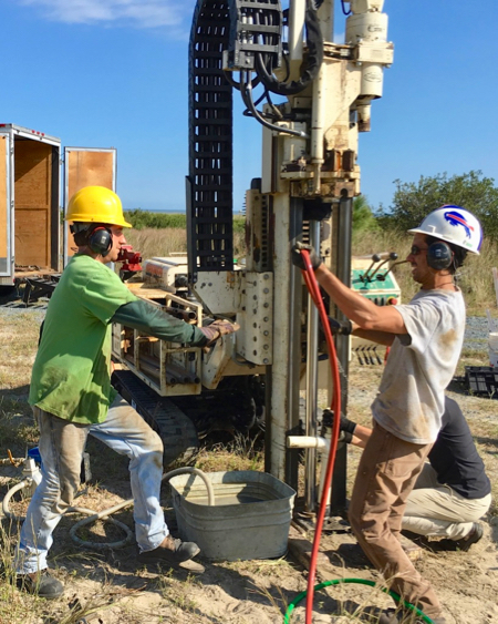 Hein joins with members of his lab to drill a sediment core on Wallops Island. © D. Malmquist/VIMS.