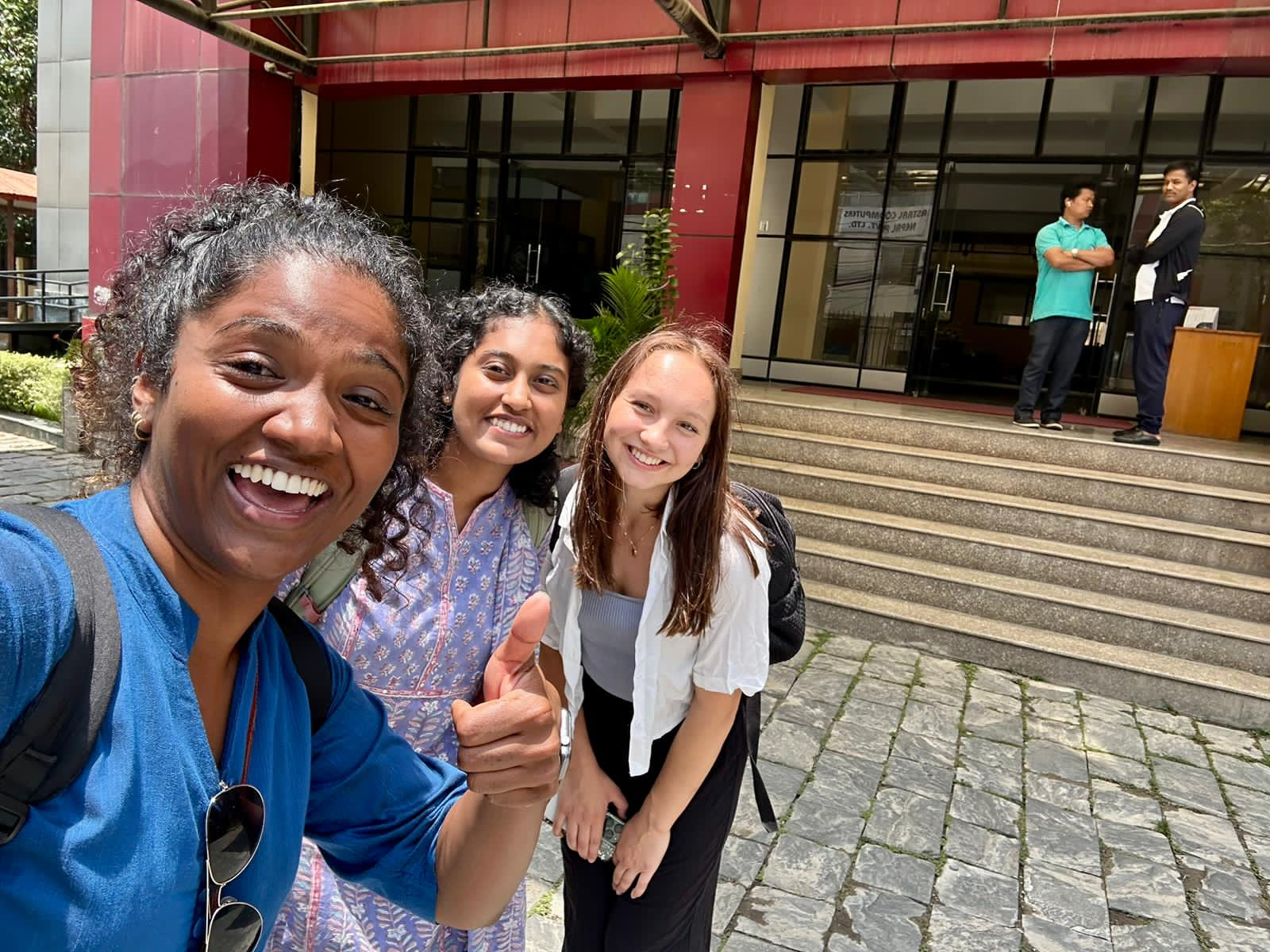 Sritharan, Jothishankar, and Wozniak (L to R) celebrate after finishing their final qualitative interview in Nepal. Photo Credit: Narayani Sritharan