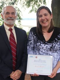 Ms. Cassie Glaspie with VIMS Dean and Director John Wells following the Awards Ceremony.