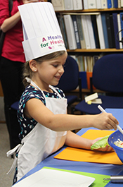 Participants enjoyed helping Chef Gross prepare the blue crab and cabbage cole slaw.