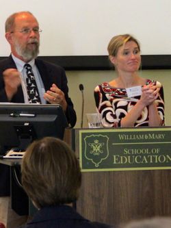 Carl Hershner and Shana Jones, conference co-hosts, discuss coastal flooding issues with participants.