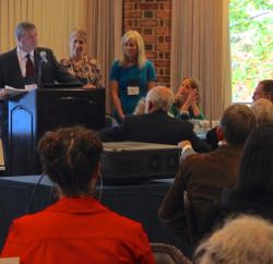 CBNERR Director William Reay (L) introduces the plenary session. Joining him on stage are (L-R) NOAA/NERRS Program Manager Erica Seiden, NERRA Executive Director Rebecca Roth, and NERRA President Cory Riley.