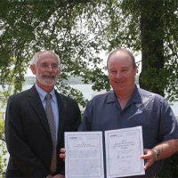 Dr. Ken Neill (right) with VIMS Dean and Director Dr. John Wells.